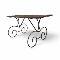 Cast iron garden table, with rectangular weathered slatted wooden top, raised on iron stra...