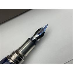 Montegrappa Emblema fountain pen, the blue pearl marbled barrel of octagonal form with silver mounts stamped 925 and silver mounted cap with 1912 emblem and clip with roller, in box, L13.5cm