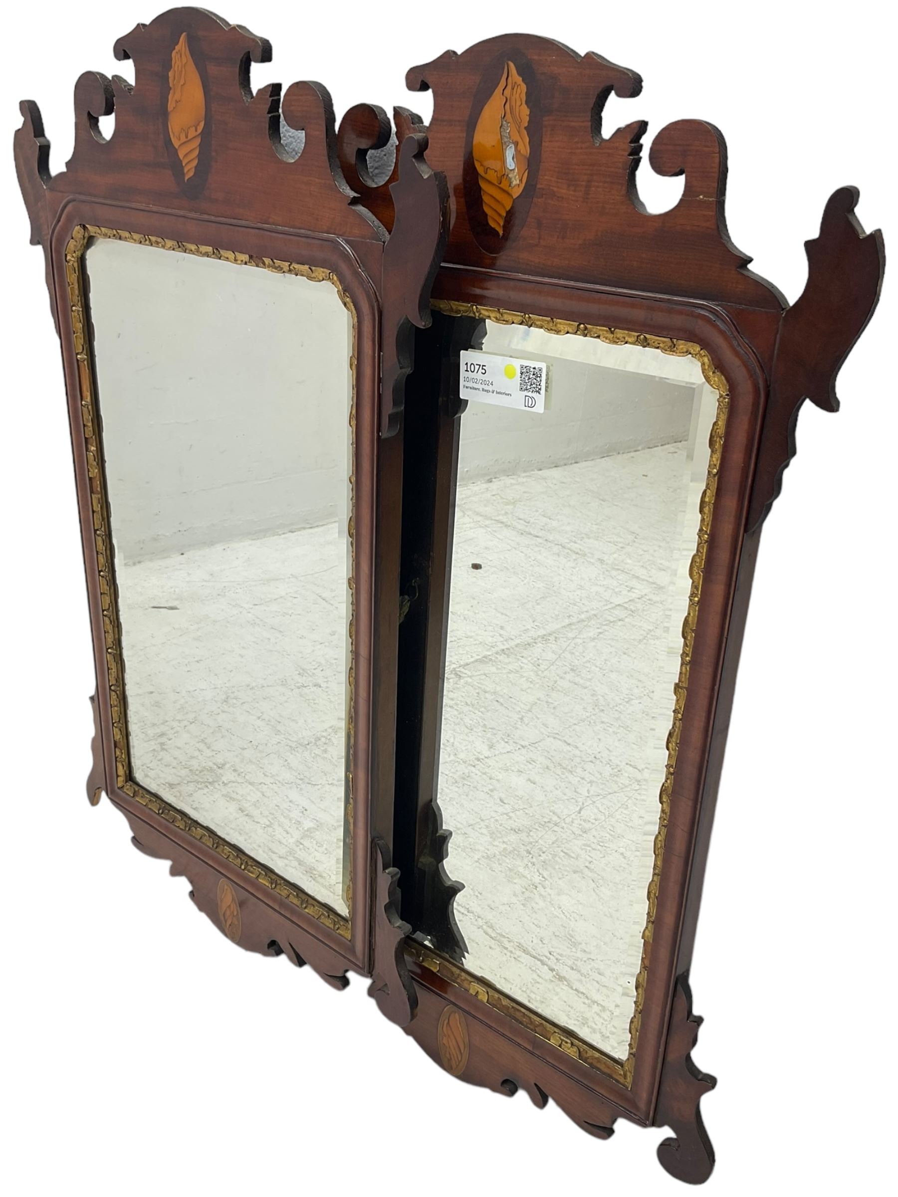 Pair of early 20th century Georgian Chippendale mahogany design wall mirrors, shaped pediment and terminal with shell motif inlays, rectangular bevelled plate within a foliate carved gilt slip