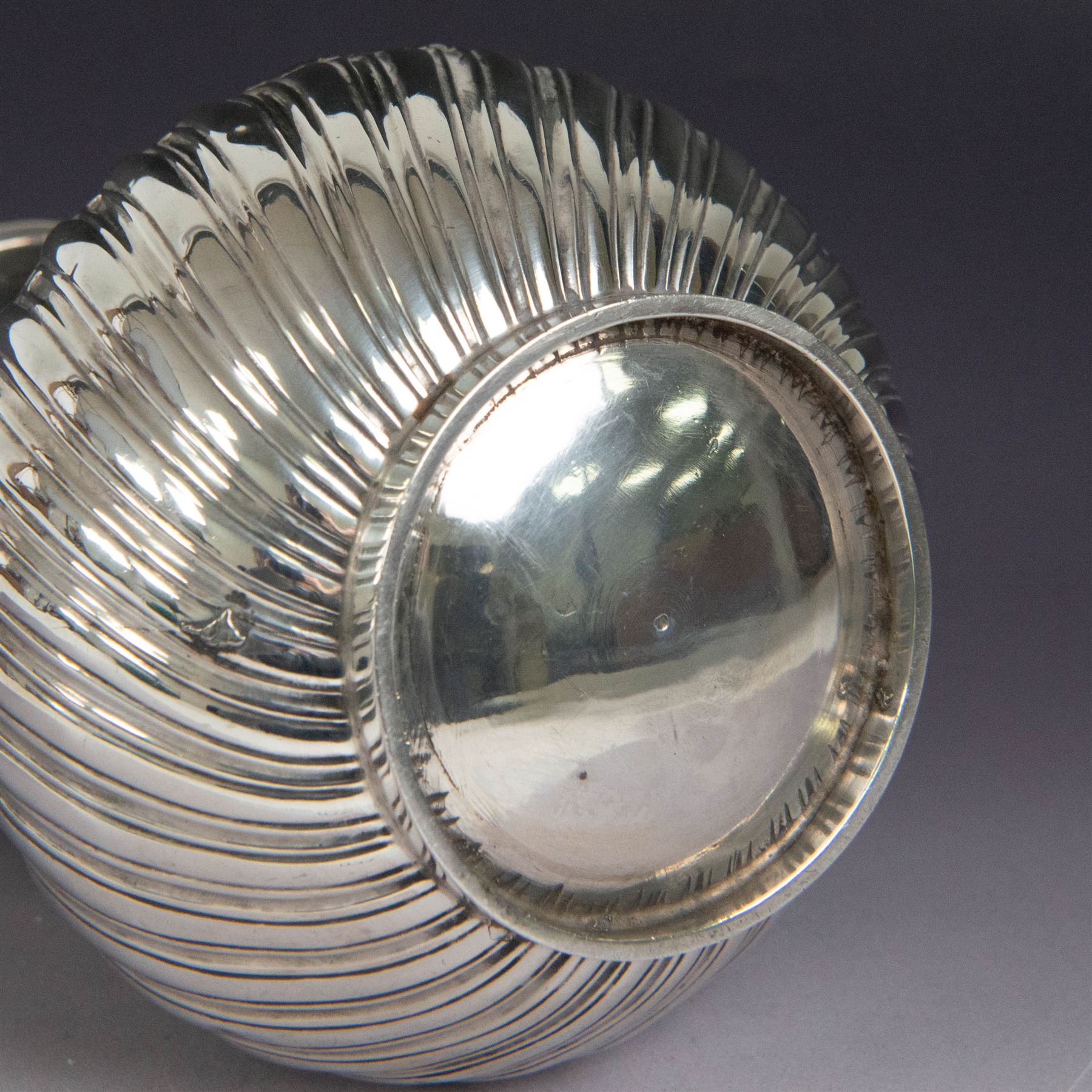 Victorian silver coffee pot, of part fluted baluster form, with central oval cartouche engraved with peryton crest, bordered by C scrolls and chased scales, with impressed acorns, stars and leaves throughout, with wooden handle and finial to domed hinged cover, hallmarked Charles Stuart Harris, London 1883, H23cm