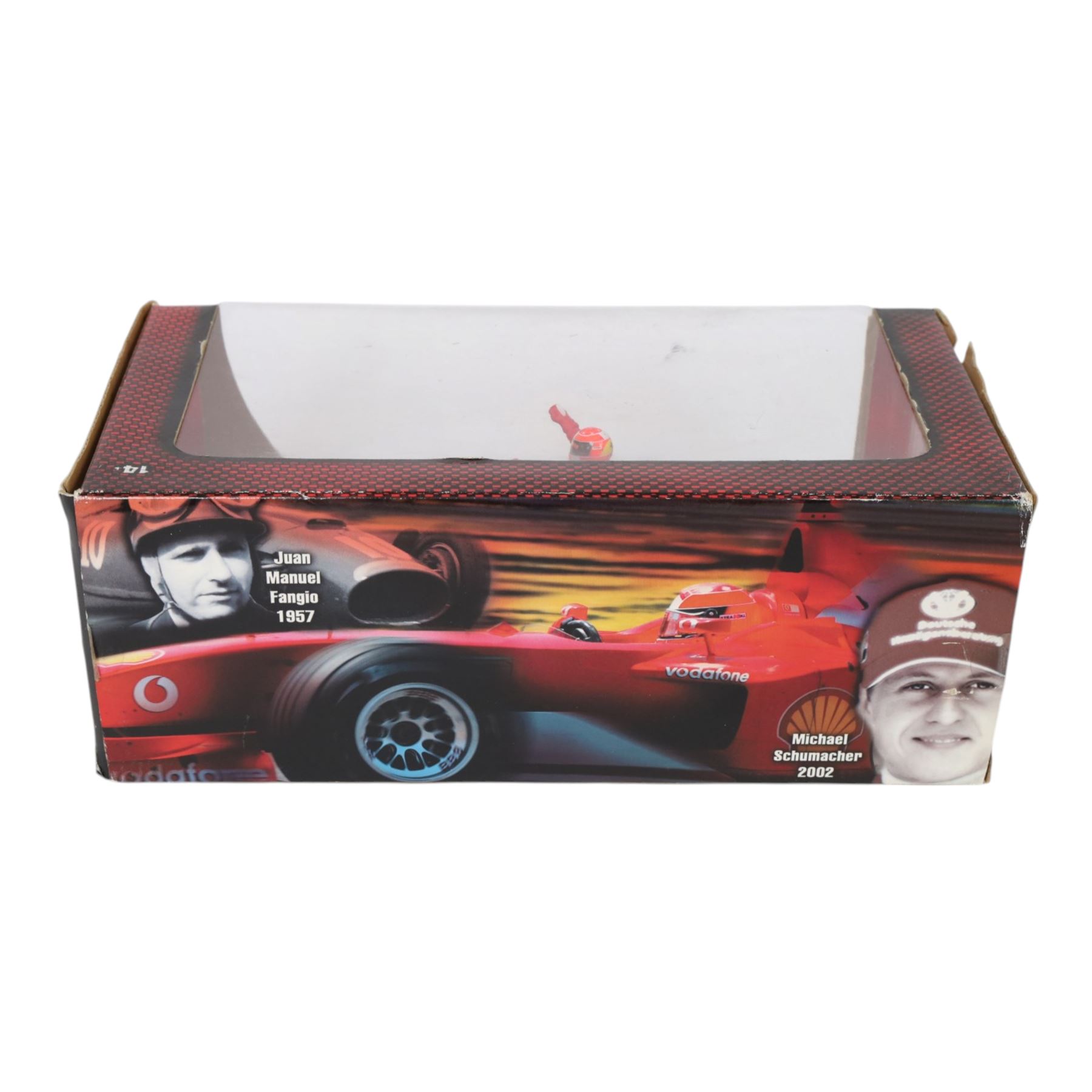 Signed Michael Schumacher Hot Wheels Ferrari 1:18 scale model, 2002 five-times World Champion edition depicting Schumacher sitting on the side of his car with arms raised, with his signature in black marker to wing of car, boxed