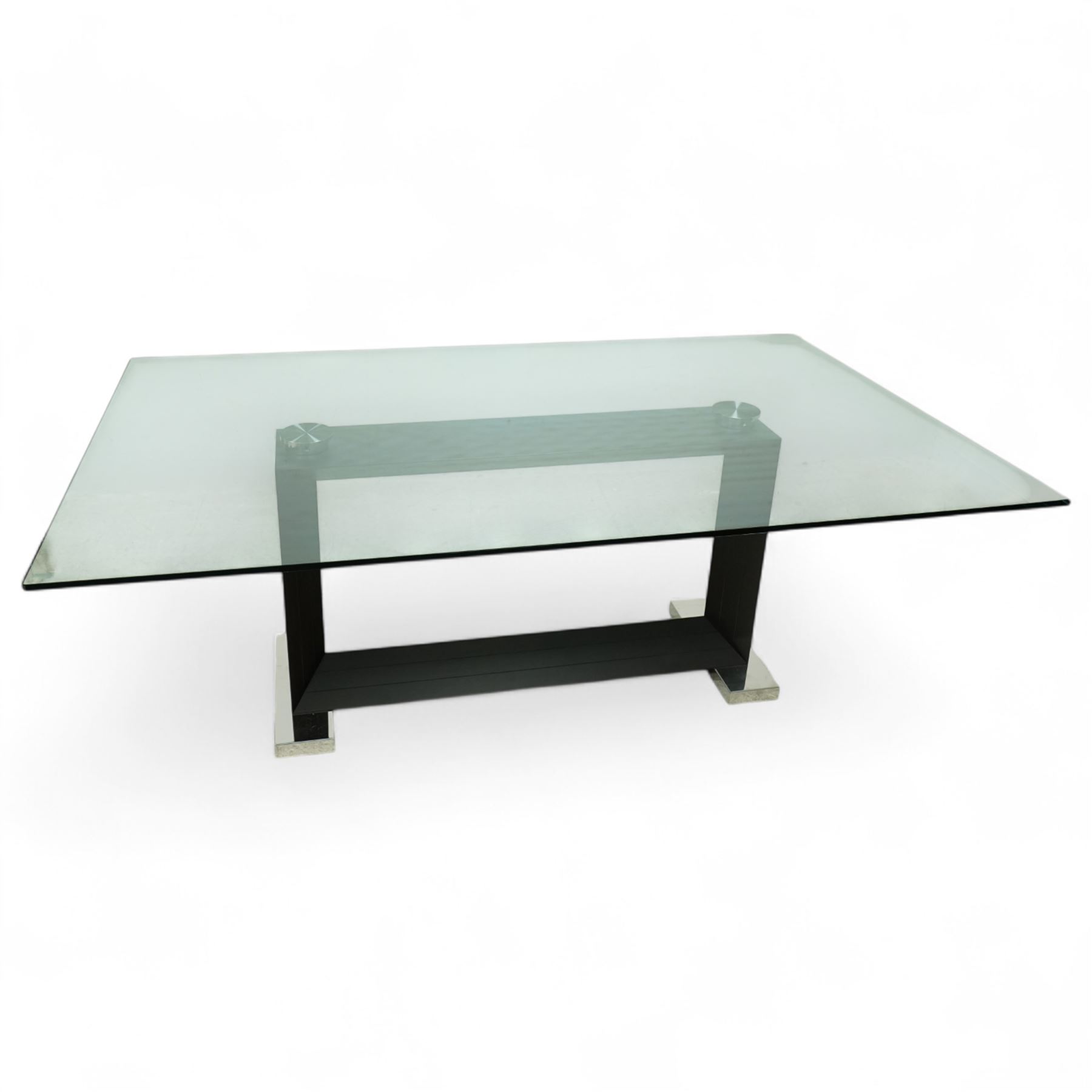 Cattelan Italia - Monaco glass top dining table on wenge base, bevelled and rounded edge clear glass top supported by twin angled black veneered uprights on a rectangular stretcher base, raised on brushed steel foot plates