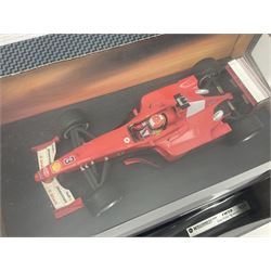 Five Mattel Hot Wheels 1:18 scale die-cast racing cars - Ferrari F1-2000 Michael Schumacher; Ferrari F-2002 Michael Schumacher; Jordan E-110 Heinz-Harald Frentzen; Williams F1 Team FW23Juan Pablo Montoya; and Ferrari F2001 Rubens Barrichello; all boxed (5)