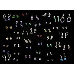 Forty-one pairs of silver stone set stud earrings including tanzanite, topaz, amethyst, quartz, chrome diopside and garnet