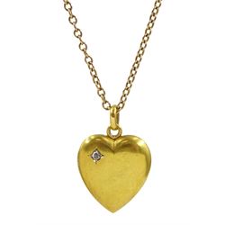 Early 20th century gold heart pendant necklace set with a single stone rose cut diamond, stamped 750, on gold chain necklace