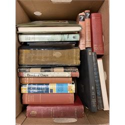 Three boxes of miscellaneous books.