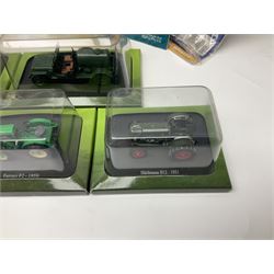 Eighteen issues of Tractors and The World of Farming magazine, together with sixty diecast tractors, all in original packaging, in three boxes 