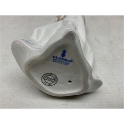 Three Lladro figures comprising, Pocket Full of Wishes no 7650, School Days no 7604 and Spring Bouquets no 7603, all with original boxes, largest example H26cm  