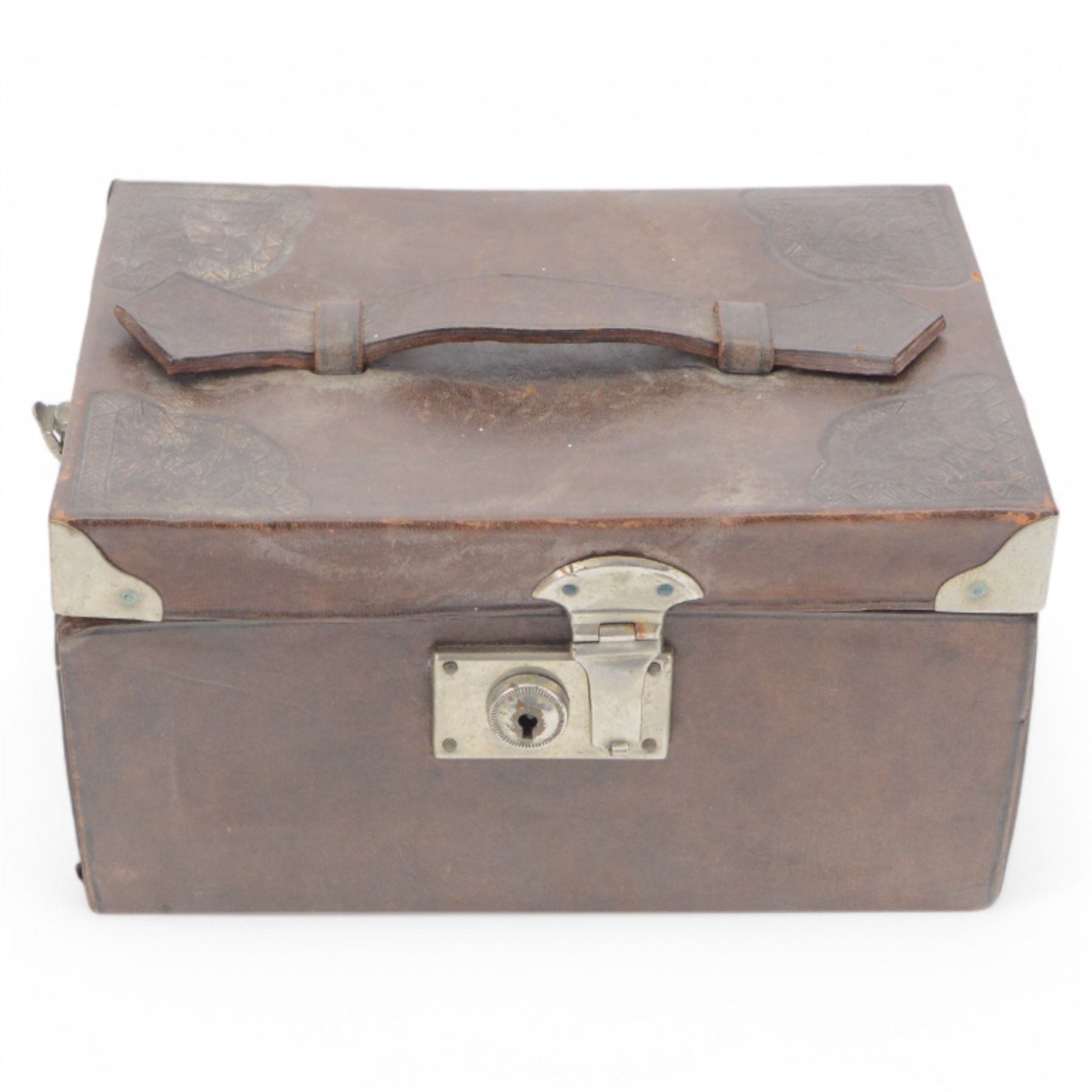 20th century Chinese Mahjong set, with five trays containing bone counters and tiles, contained within a leather bound travelling case with embossed detailing