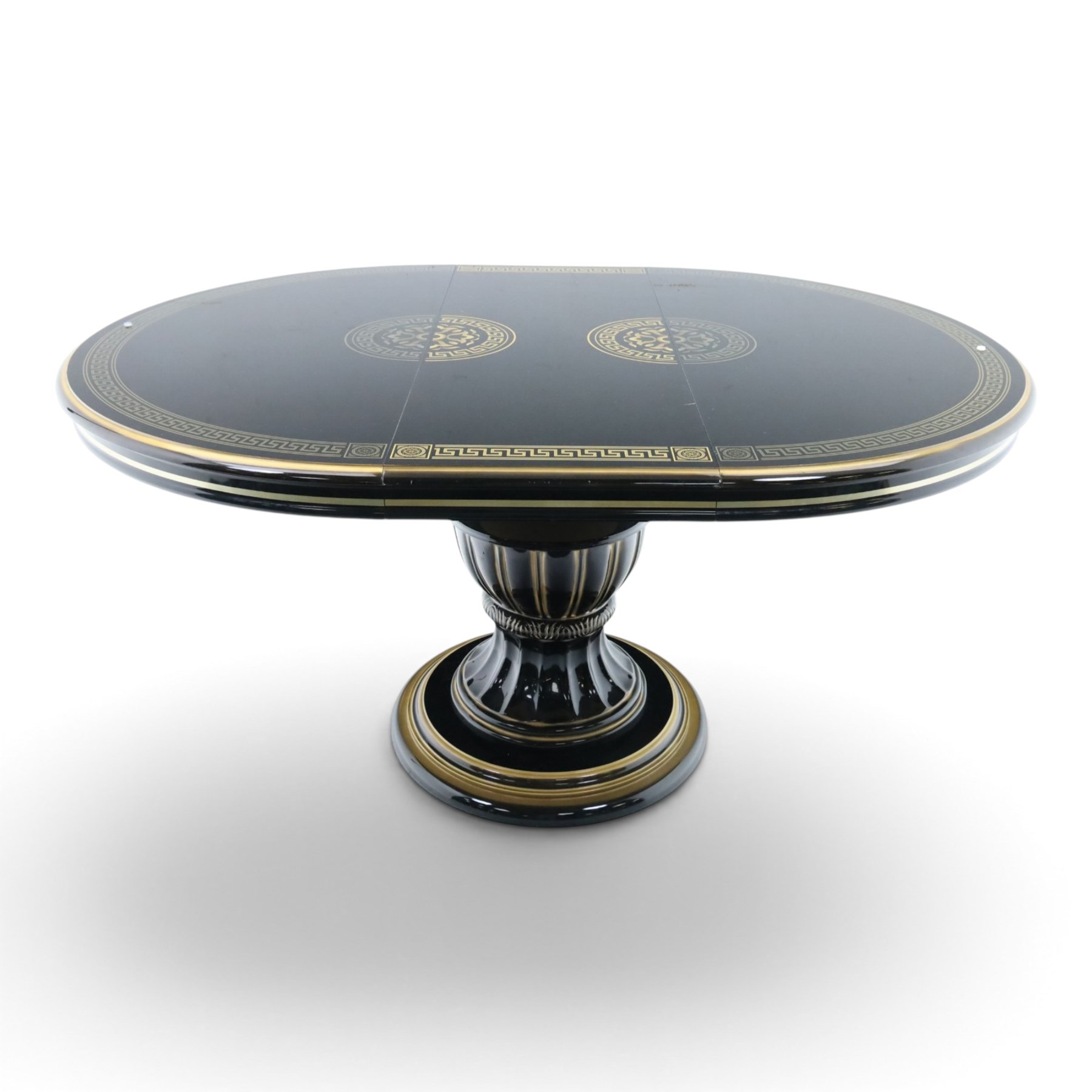 Italian Neoclassical inspired ebonised gloss dining table with four matching chairs,  circular top with additional leaf (Extends to  145cm) with Greek key banding, on a shaped pedestal base with gilt highlights and stepped plinth, the chairs en suite with padded back and seat with Greek key, reeded front supports