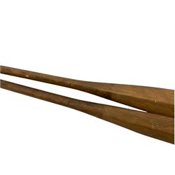 Pair of wooden lifeboat oars L366cm, together with Perrybuoy life ring inscribed 'Hispaniola' and two other life rings inscribed 'Kay's Cafe'