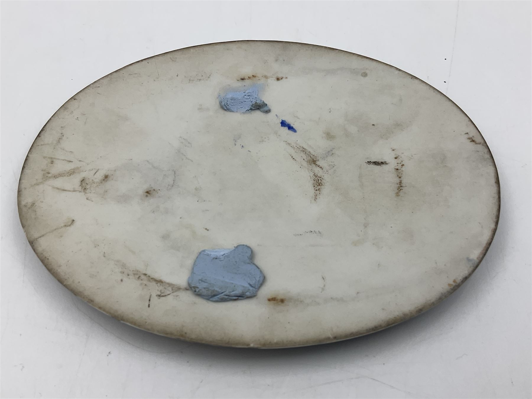 19th century Continental porcelain plaque, of oval form, painted with the Madonna and Child after Raphael, unmarked, possibly KPM, H12cm W9cm 