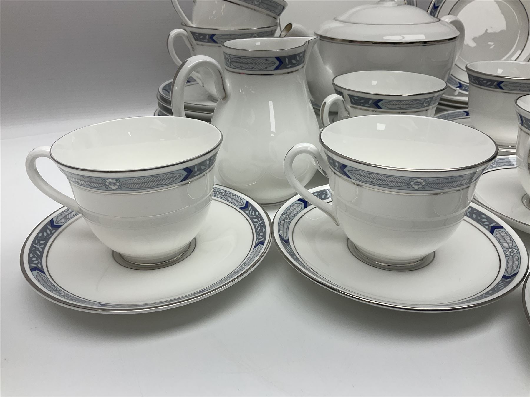 Royal Worcester Beaufort tea service, comprising teapot, milk jug, open saucier, eleven teacups, twelve saucers, eight dessert plates and one cake plate