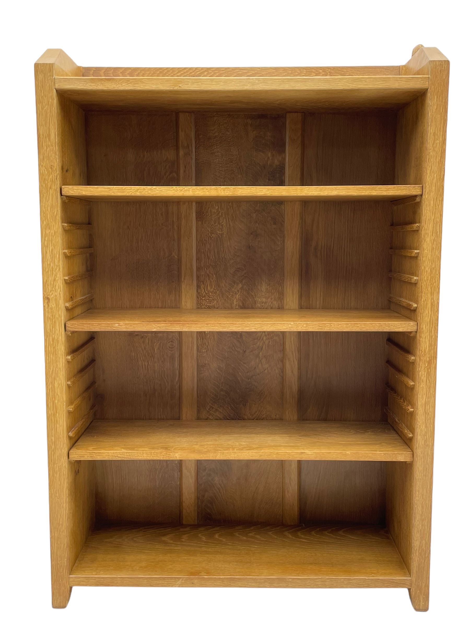 'Rabbitman' oak bookcase, fitted with three adjustable shelves, the top carved with rabbit signature, by Peter Heap of Wetwang