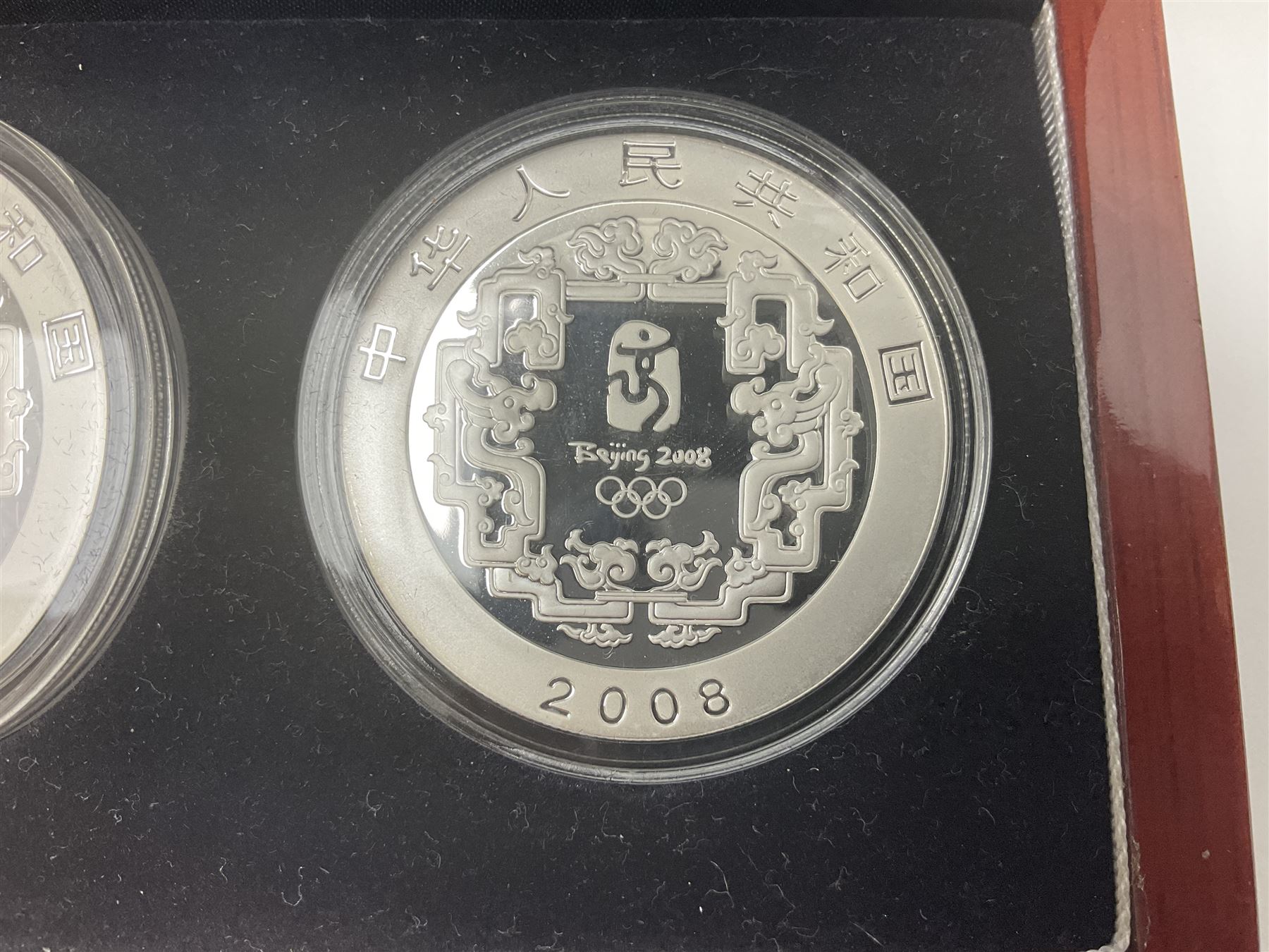 China 2008 Beijing Olympic Games official commemorative silver four coin set, cased with certificates