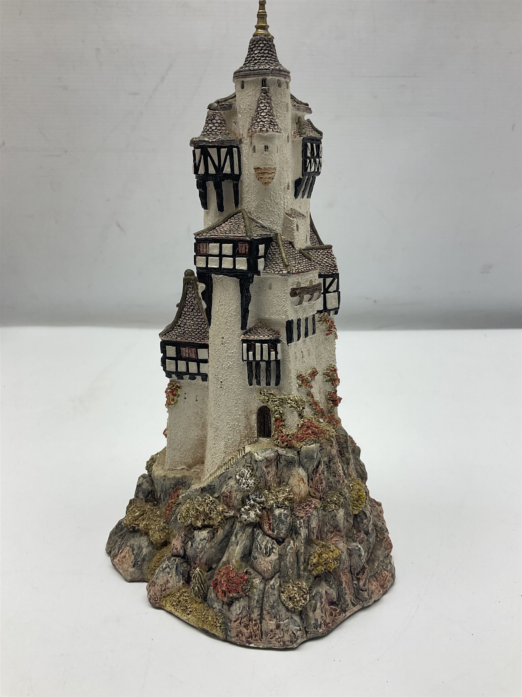 Five Lilliput Lanes, comprising Christmas at Woody Bay Station and Calling Home for Christmas both from the Illuminated collection, Castle of the Exiled Prince, Castle of The Ransomed King and Helvellyn, all with original boxes (5)