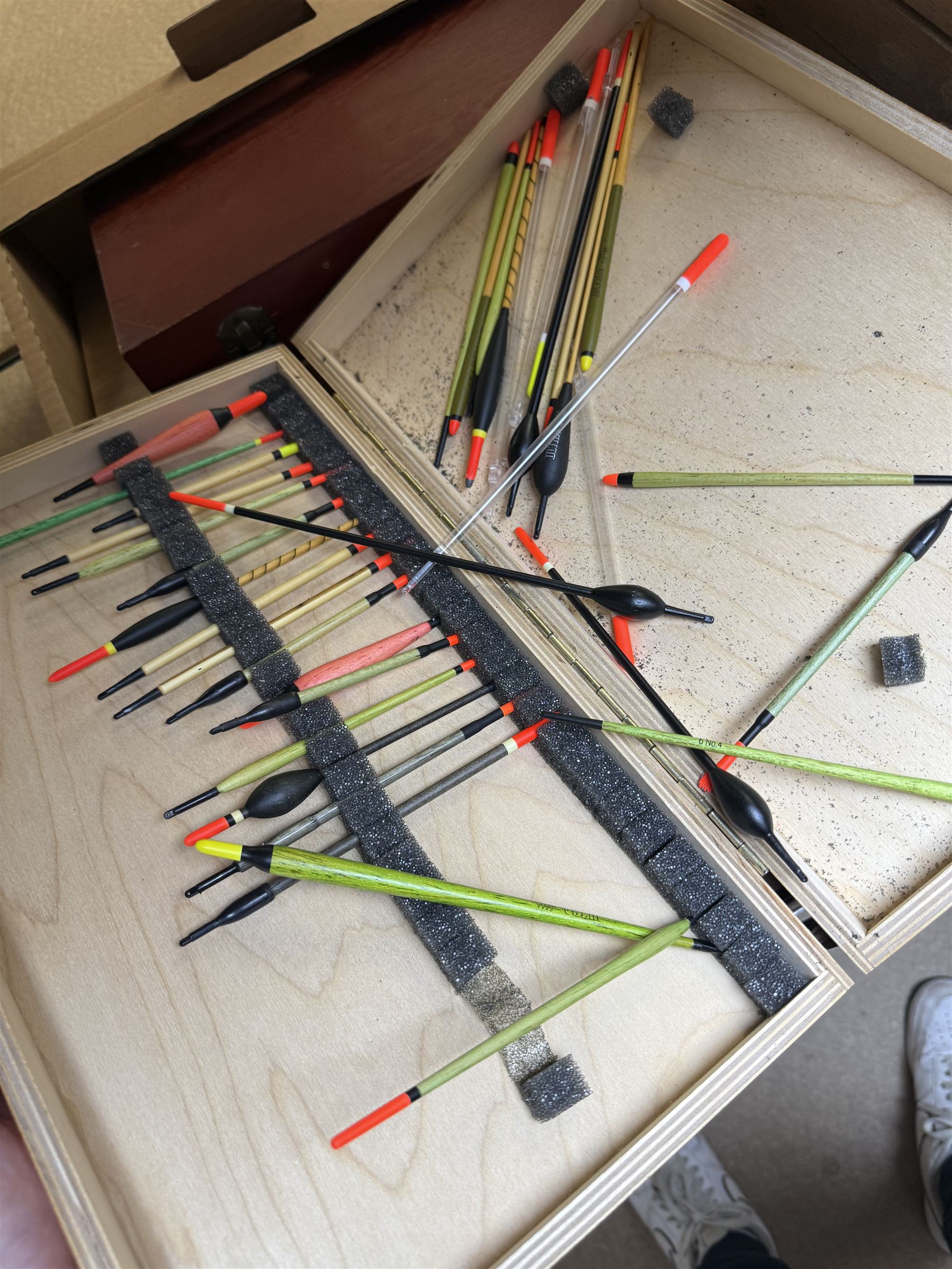 Collection of fishing equipment, including lures, floats and flies 