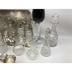 Collection of silver plate, to include egg cruet, twin handled tray with pierced decoration, cruet set, etc together with a selection of glassware to include decanters, tankards etc 