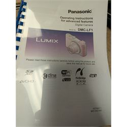 Panasonic Lumix DMC-LF1 digital camera, with charger and instruction booklet, together with a Minolta Dynax 5000i SLR camera body with a Minolta AF Zoom 35-80mm 1:4 (22)-5.6 lens, and a Fujifilm Finepix T digital camera