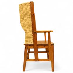 Pair of 20th century full-size pine Orkney chairs, high-back armchairs of traditional design, pegged and wedged construction, wrap-around backrest and sides, above scrolled out-swept arms and solid rounded pine seat, raised on square tapering legs united by stretchers, hand-signed ‘Jackie Miller’ and stamped ‘Orkney’
