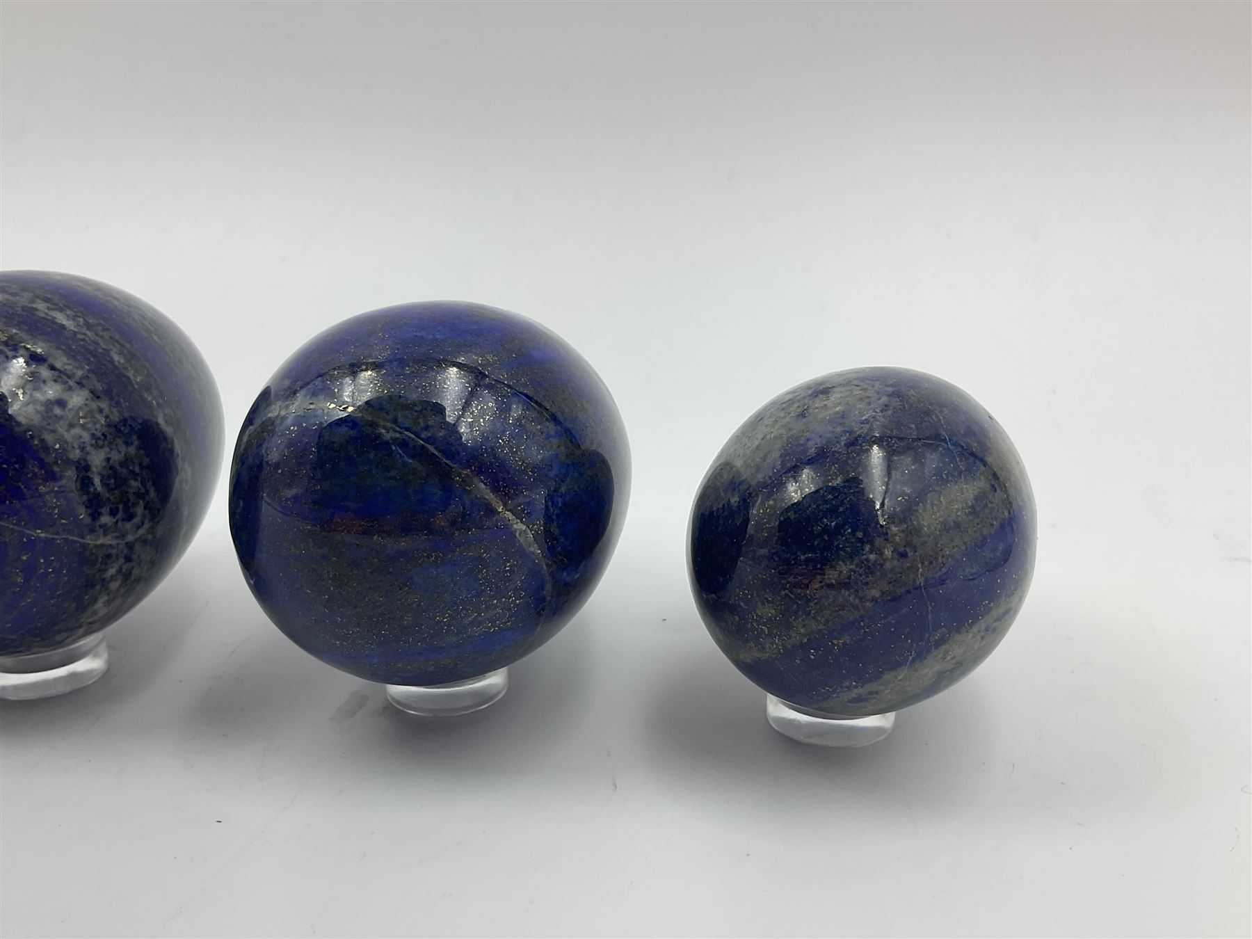 Collection of five Lapis lazuli specimen eggs, largest egg H7cm