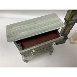 Collection of miniature dolls house furniture, to include five drawer chest painted with blossom, cream and gilt double door mirrored wardrobe, four piece lacquered style desk set, three piece suite, writing desk, wash stand, Knoll style sofa etc (14)