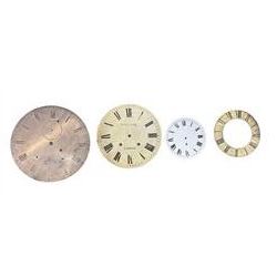 Six clock dials and an engraved brass chapter ring.
Comprising of four 18th century brass longcase dials with two painted wall clock dials and an 18th century engraved single-handed brass chapter ring.