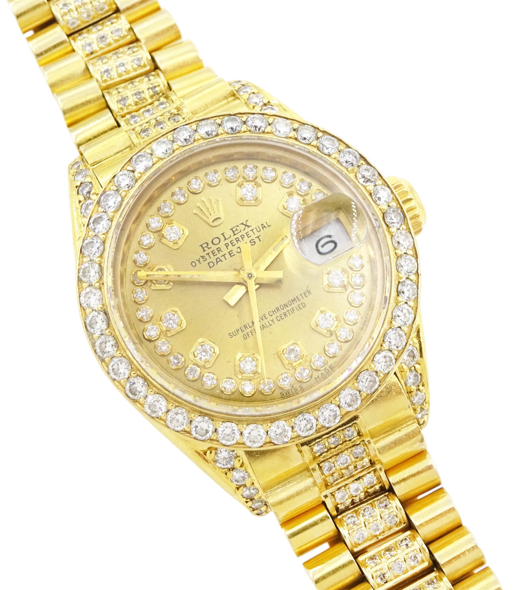 Rolex Oyster Perpetual Datejust ladies 18ct gold automatic wristwatch, circa 1983, Ref. 69178, serial No. 8058240, champagne dial diamond dot hour markers and outer diamond ring, after market diamond set bezel and lugs, on 18ct gold President bracelet, set with after market diamonds, with AIGL report and additional links