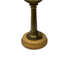 Early 20th century, illuminating brass ship's telegraph by Chadburns of Liverpool and London, on a circular wooden plinth, H55cm