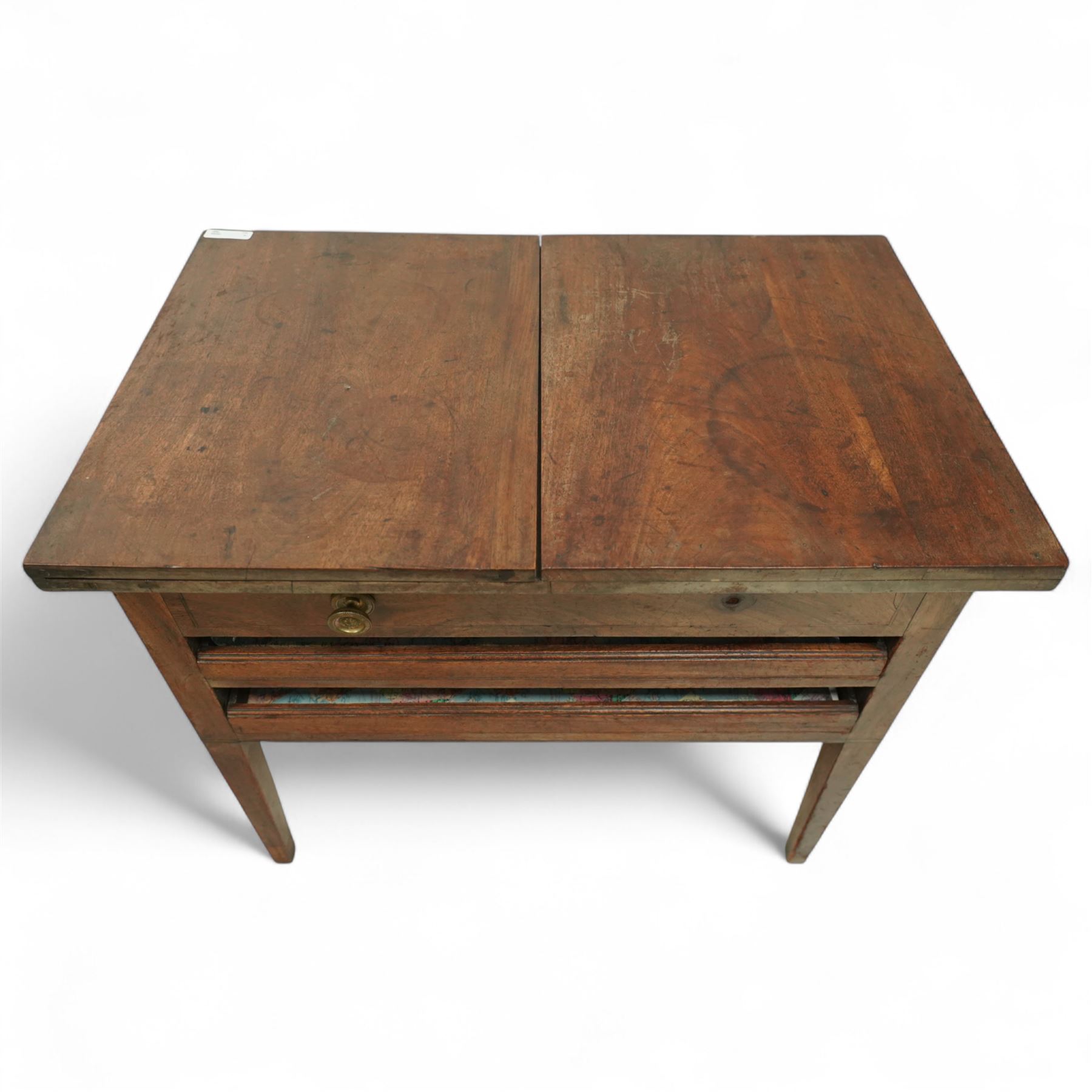 Georgian mahogany folio stand, rectangular top with hinged section and drop leaf to one end, fitted with a single drawer and two open slatted folio divisions, raised on square tapering supports