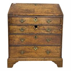 18th century oak bureau, fall-front enclosing central cupboard with flanking correspondence drawers and pigeonholes, over four graduating drawers, lower moulded edge on bracket feet