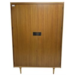 Wrighton - mid-20th century teak wardrobe, two doors enclosing hanging rail, shelves and hinged compartments, on turned tapering feet