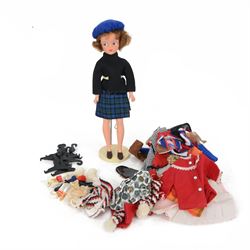 1963/4 Pedigree Sindy doll, with brunette hair, red pursed lips and blue eyes, stamped Made in England to back of head, dressed in Sindy Lunch Date outfit, with a collection of mostly Pedigree Sindy clothes and other accessories