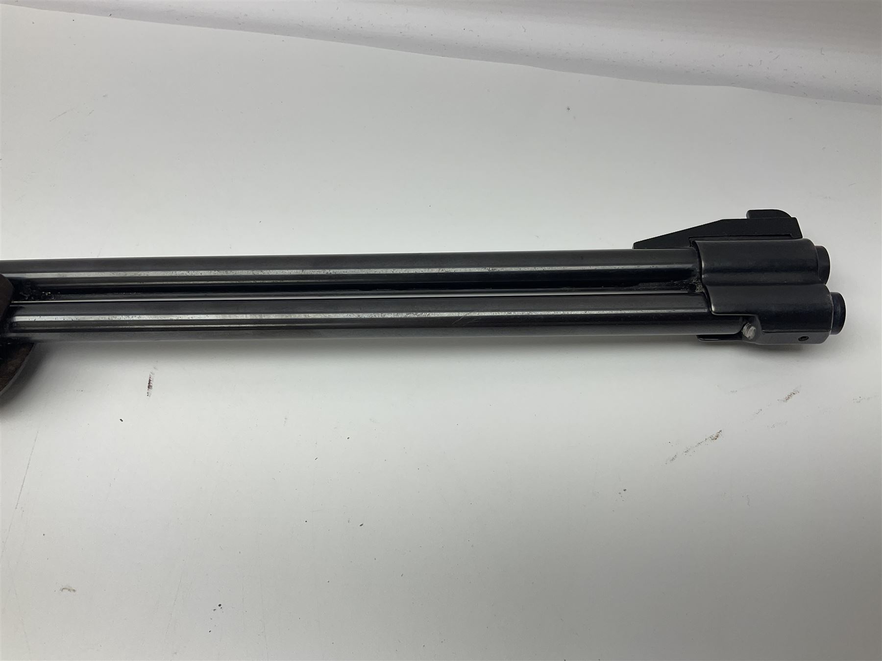 Weihrauch model HW 77 K  .22 air rifle with under lever action, beech stock with chequered pistol grip and Tasco WA39x40-1 scope, serial no.1283661 L102cm overall NB: AGE RESTRICTIONS APPLY TO THE PURCHASE OF THIS LOT