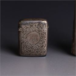 1920s silver cigarette case, with engraved initials and foliate decoration to cover and personal engraving to interior, hallmarked Smith & Bartlam, Birmingham 1924, with a similar silver vesta case, hallmarked, cigarette case H8.5cm