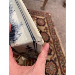 19th century Chinese blue and white planter and stand, each of square slightly tapering and flared form, the planter decorated with figures and precious objects between stylised foliate borders, the stand decorated with landscapes beneath a lipped rim with cell band, planter H28cm D25.5cm, stand H7cm D26cm