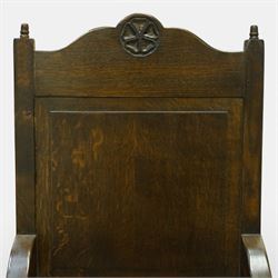 20th century oak refectory style dining table and eight chairs (6 + 2), rectangular top on two large carved baluster pedestal supports with leaf decoration, on splayed trestle bases joined by a stretcher, with eight matching oak dining chairs, each with Yorkshire rose carved cresting rail, panel back and solid seat, raised on turned supports united by stretchers