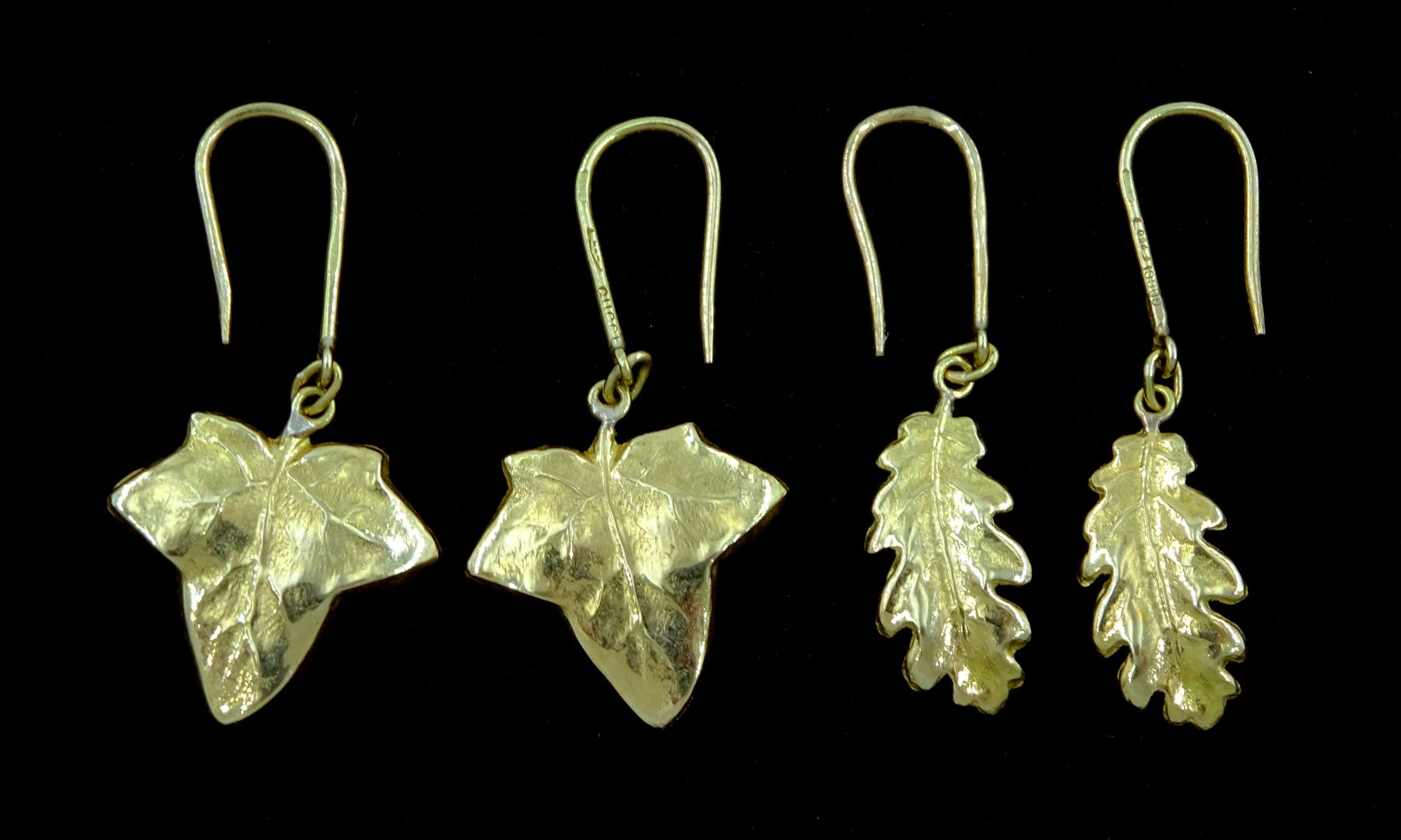Pair of 18ct gold oak leaf design pendant earrings and one other pair of 18ct gold leaf earrings, both stamped 750, approx 4.2gm