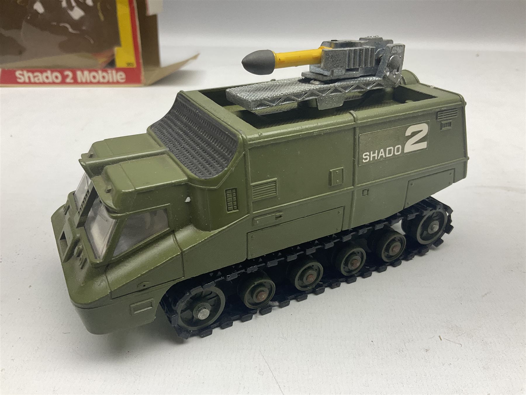 Corgi - die-cast model of James Bond Aston Martin DB5 No.271 with silver body and red interior, gold bumpers and four-spoke wheels, James Bond and two bandit figures; original window box with header card; and Dinky Shado 2 Mobile with one missile No.353; in window box (2)