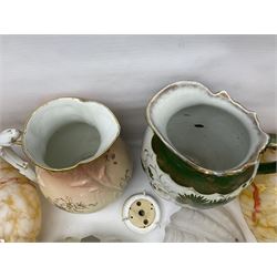 Two Art Deco mottled glass fly catcher ceiling light shades, together with two other 1930s moulded glass ceiling light shades and two Victorian style wash jugs, largest shade D33cm