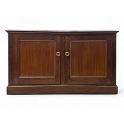 Victorian mahogany cupboard, plain rectangular top above two fielded panel doors opening t...