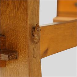 Beaverman - oak adzed top refectory table, the rectangular top raised on twin trestle supports with shaped feet united by a stretcher, the joints secured with exposed pegs, with carved beaver signature, by Colin Almack of Sutton near Thirsk