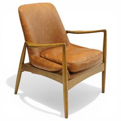 Mid-century design teak open easy armchair with brown leather upholstery, with shaped oak armrests and supports