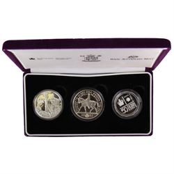 Queen Elizabeth II 2002 'The Accession Set' comprising United Kingdom five pounds,  Canada one Dollar and Australia fifty cents, cased with certificate