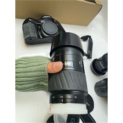 Six Minolta Dynax SLR camera bodies, comprising 800si serial no. 62703606, three 7xi examples, including one boxed example, serial nos. 20106944, 16123311 & 22107553, and two 9xi examples, serial no. 18209901 & 18202113, with three Minolta lenses, including Zoom xi 28-105mm 1:3.5(22)-4.5 lens, AF Zoom 28-85mm 1:3.5 (22)-4.5 lens and an AF Zoom 75-300mm 1:4.5(32)-5.6 lens, Hama carry case and other accessories