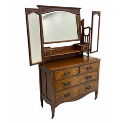 Late Victorian walnut triple mirror back dressing chest, two trinket drawers above two short an two long drawers, shaped apron, square tapering supports