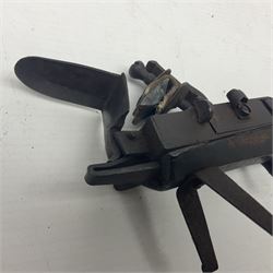 Late 18th/early 19th century flintlock tinder lighter, the steel box lock with hinged door to the left side, fruitwood butt with plain bar trigger, the left side set with a taper sconce and bipod front support, L21cm.