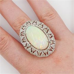 Silver opal and diamond ring, the cabochon opal of approx 9.65 carat, with round brilliant cut diamond surround, in a pierced design setting, stamped, total diamond weight approx 1.50 carat