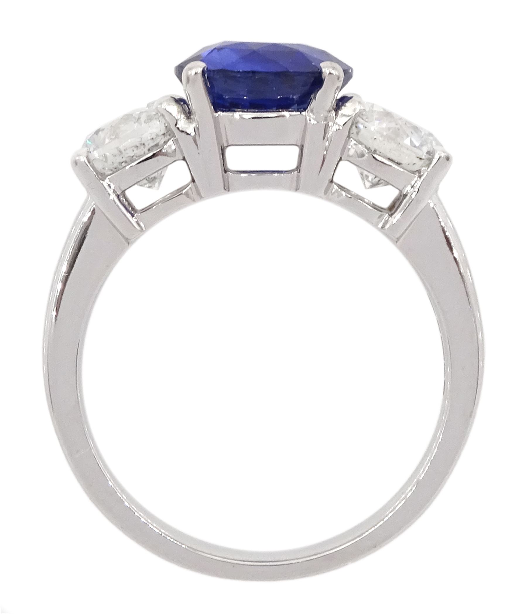 18ct white gold three stone sapphire and round brilliant cut diamond ring, hallmarked, sapphire approx 2.20 carat, total diamond weight approx 1.45 carat