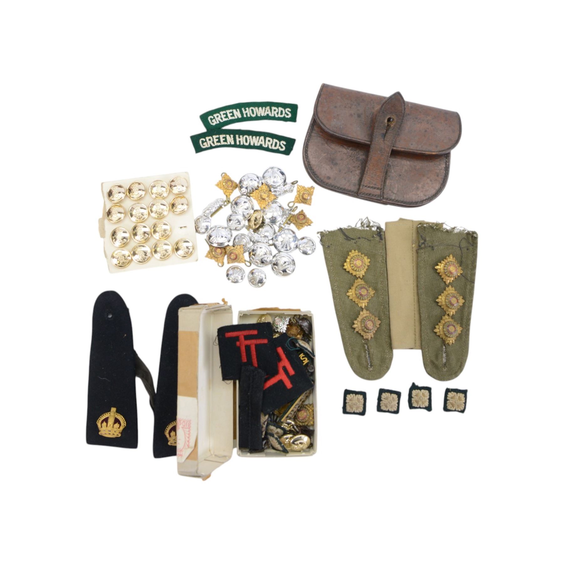 Two British Berets, fine green wool cloth with leather trim, cloth lining having makers details of “BRITISH BERET BASQUE LTD”, one with The Green Howards cap badge, together with other Green Howards buttons and badges, webbing bags and other military items
